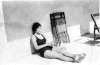 Photos04_Sitting-in-swimsuit.gif (91342 bytes)