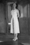 Photos04_White-dress-infrontof-mirr.gif (105009 bytes)
